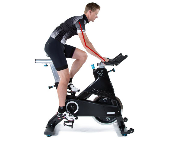 How high should the handlebars be on a spin bike?